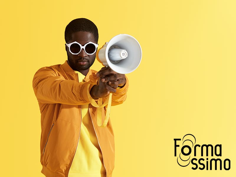 Black man in fashion sunglasses with megaphone portrait